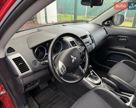 Красный Мицубиси Аутлендер ХЛ, объемом двигателя 2.2 л и пробегом 227 тыс. км за 11999 $, фото 20 на Automoto.ua