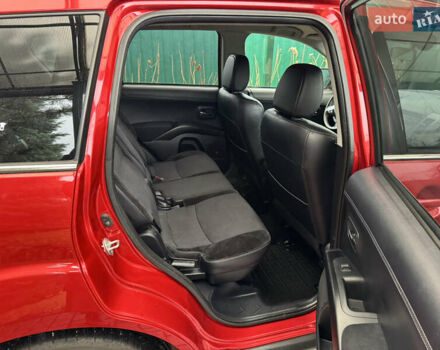 Красный Мицубиси Аутлендер ХЛ, объемом двигателя 2.2 л и пробегом 227 тыс. км за 11999 $, фото 43 на Automoto.ua