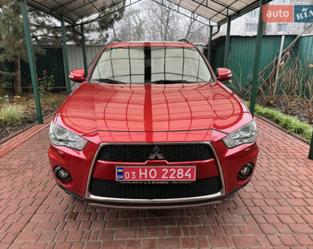 Красный Мицубиси Аутлендер ХЛ, объемом двигателя 2.2 л и пробегом 227 тыс. км за 11999 $, фото 9 на Automoto.ua