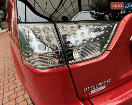Красный Мицубиси Аутлендер ХЛ, объемом двигателя 2.2 л и пробегом 227 тыс. км за 11999 $, фото 15 на Automoto.ua