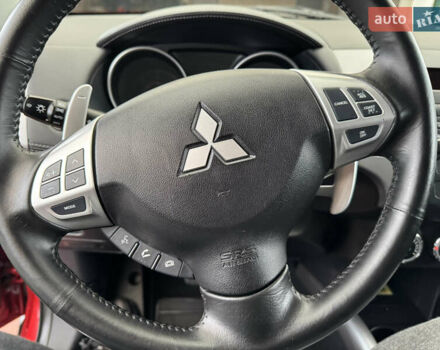 Красный Мицубиси Аутлендер ХЛ, объемом двигателя 2.2 л и пробегом 227 тыс. км за 11999 $, фото 21 на Automoto.ua