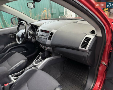 Красный Мицубиси Аутлендер ХЛ, объемом двигателя 2.2 л и пробегом 227 тыс. км за 11999 $, фото 53 на Automoto.ua