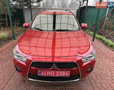 Красный Мицубиси Аутлендер ХЛ, объемом двигателя 2.2 л и пробегом 227 тыс. км за 11999 $, фото 8 на Automoto.ua