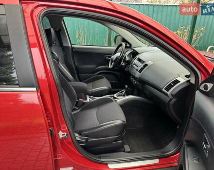 Красный Мицубиси Аутлендер ХЛ, объемом двигателя 2.2 л и пробегом 227 тыс. км за 11999 $, фото 49 на Automoto.ua