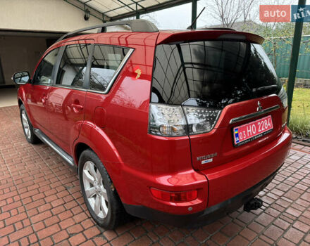 Красный Мицубиси Аутлендер ХЛ, объемом двигателя 2.2 л и пробегом 227 тыс. км за 11999 $, фото 3 на Automoto.ua