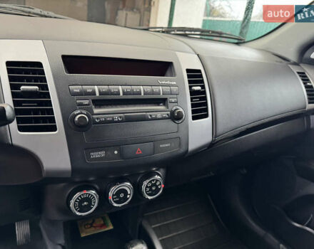 Красный Мицубиси Аутлендер ХЛ, объемом двигателя 2.2 л и пробегом 227 тыс. км за 11999 $, фото 25 на Automoto.ua