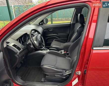 Красный Мицубиси Аутлендер ХЛ, объемом двигателя 2.2 л и пробегом 227 тыс. км за 11999 $, фото 16 на Automoto.ua