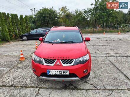 Красный Мицубиси Аутлендер ХЛ, объемом двигателя 2.36 л и пробегом 316 тыс. км за 6000 $, фото 1 на Automoto.ua