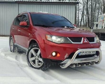 Красный Мицубиси Аутлендер ХЛ, объемом двигателя 2.36 л и пробегом 222 тыс. км за 8300 $, фото 1 на Automoto.ua