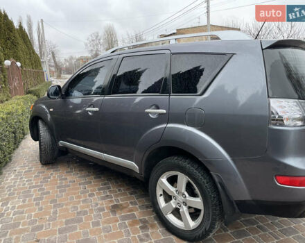 Мицубиси Аутлендер ХЛ, объемом двигателя 2.4 л и пробегом 258 тыс. км за 8800 $, фото 1 на Automoto.ua