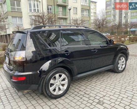 Мицубиси Аутлендер ХЛ, объемом двигателя 2.36 л и пробегом 244 тыс. км за 9999 $, фото 3 на Automoto.ua