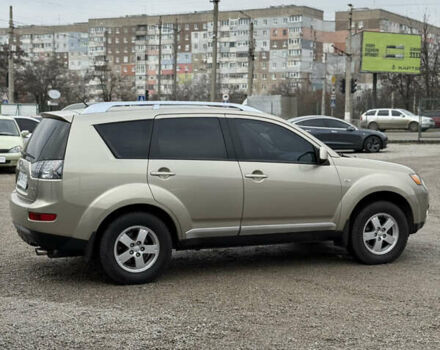 Желтый Мицубиси Аутлендер ХЛ, объемом двигателя 1.97 л и пробегом 204 тыс. км за 8400 $, фото 4 на Automoto.ua