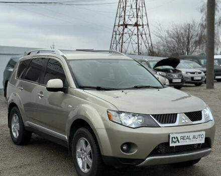Желтый Мицубиси Аутлендер ХЛ, объемом двигателя 1.97 л и пробегом 204 тыс. км за 8400 $, фото 5 на Automoto.ua