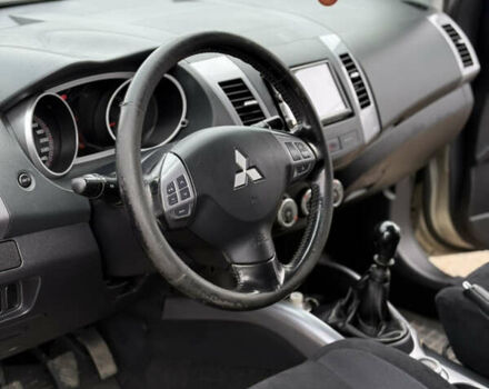 Желтый Мицубиси Аутлендер ХЛ, объемом двигателя 1.97 л и пробегом 204 тыс. км за 8400 $, фото 14 на Automoto.ua