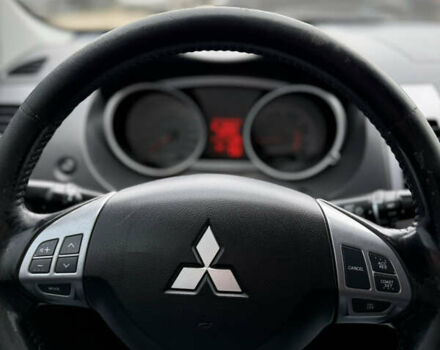 Желтый Мицубиси Аутлендер ХЛ, объемом двигателя 1.97 л и пробегом 204 тыс. км за 8400 $, фото 18 на Automoto.ua