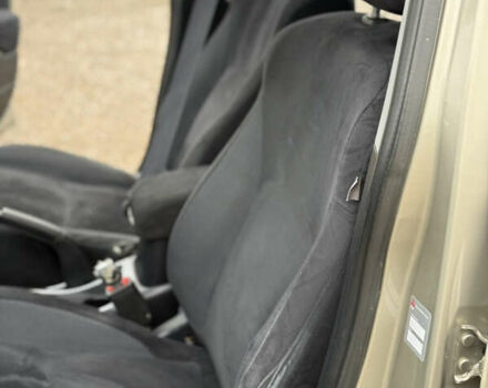 Желтый Мицубиси Аутлендер ХЛ, объемом двигателя 1.97 л и пробегом 204 тыс. км за 8400 $, фото 15 на Automoto.ua