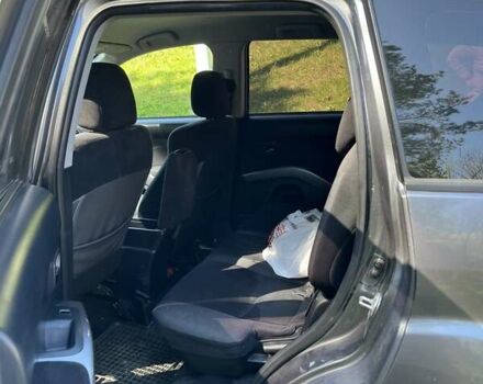 Серый Мицубиси Аутлендер ХЛ, объемом двигателя 2 л и пробегом 247 тыс. км за 5000 $, фото 11 на Automoto.ua