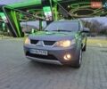 Серый Мицубиси Аутлендер ХЛ, объемом двигателя 2.2 л и пробегом 268 тыс. км за 8999 $, фото 7 на Automoto.ua