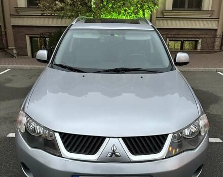 Серый Мицубиси Аутлендер ХЛ, объемом двигателя 3 л и пробегом 129 тыс. км за 10450 $, фото 3 на Automoto.ua