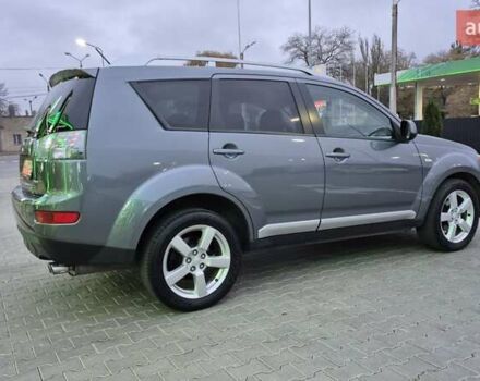 Серый Мицубиси Аутлендер ХЛ, объемом двигателя 2.2 л и пробегом 268 тыс. км за 8999 $, фото 3 на Automoto.ua