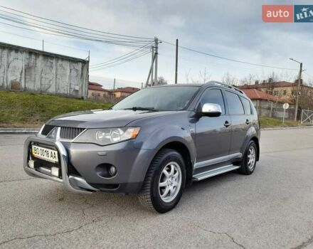 Серый Мицубиси Аутлендер ХЛ, объемом двигателя 3 л и пробегом 183 тыс. км за 10300 $, фото 1 на Automoto.ua