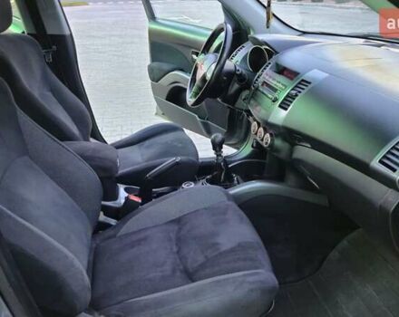 Серый Мицубиси Аутлендер ХЛ, объемом двигателя 2.2 л и пробегом 268 тыс. км за 8999 $, фото 55 на Automoto.ua