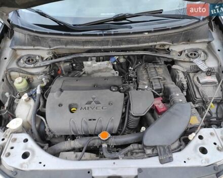 Серый Мицубиси Аутлендер ХЛ, объемом двигателя 2.4 л и пробегом 307 тыс. км за 8299 $, фото 54 на Automoto.ua