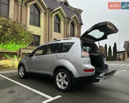 Серый Мицубиси Аутлендер ХЛ, объемом двигателя 3 л и пробегом 129 тыс. км за 10450 $, фото 46 на Automoto.ua