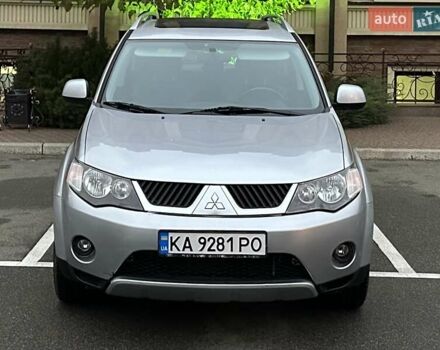 Серый Мицубиси Аутлендер ХЛ, объемом двигателя 3 л и пробегом 129 тыс. км за 10450 $, фото 1 на Automoto.ua
