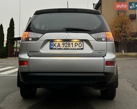 Серый Мицубиси Аутлендер ХЛ, объемом двигателя 3 л и пробегом 129 тыс. км за 10450 $, фото 16 на Automoto.ua