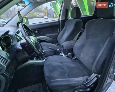 Серый Мицубиси Аутлендер ХЛ, объемом двигателя 2.2 л и пробегом 268 тыс. км за 8999 $, фото 45 на Automoto.ua