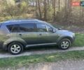 Серый Мицубиси Аутлендер ХЛ, объемом двигателя 2 л и пробегом 247 тыс. км за 5000 $, фото 1 на Automoto.ua