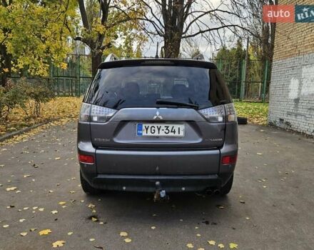 Серый Мицубиси Аутлендер ХЛ, объемом двигателя 2 л и пробегом 450 тыс. км за 4600 $, фото 9 на Automoto.ua