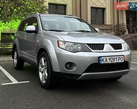 Серый Мицубиси Аутлендер ХЛ, объемом двигателя 3 л и пробегом 129 тыс. км за 10450 $, фото 6 на Automoto.ua