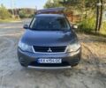 Серый Мицубиси Аутлендер ХЛ, объемом двигателя 3 л и пробегом 172 тыс. км за 9500 $, фото 5 на Automoto.ua