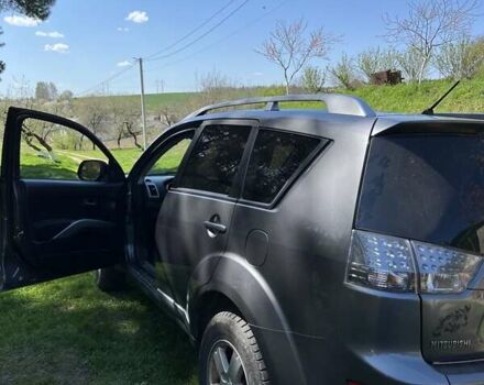 Серый Мицубиси Аутлендер ХЛ, объемом двигателя 2 л и пробегом 247 тыс. км за 5000 $, фото 12 на Automoto.ua