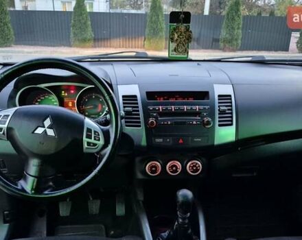Серый Мицубиси Аутлендер ХЛ, объемом двигателя 2.2 л и пробегом 268 тыс. км за 8999 $, фото 31 на Automoto.ua