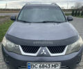 Серый Мицубиси Аутлендер ХЛ, объемом двигателя 3 л и пробегом 253 тыс. км за 8500 $, фото 2 на Automoto.ua