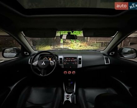 Серый Мицубиси Аутлендер ХЛ, объемом двигателя 3 л и пробегом 129 тыс. км за 10450 $, фото 37 на Automoto.ua