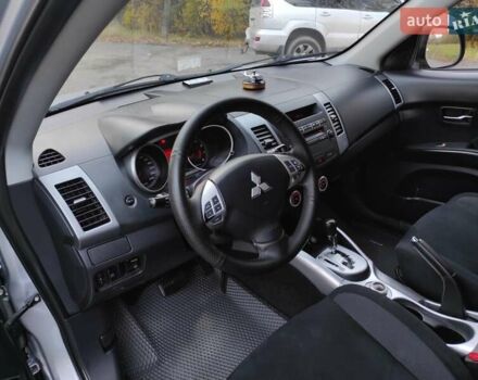 Серый Мицубиси Аутлендер ХЛ, объемом двигателя 2.4 л и пробегом 307 тыс. км за 8299 $, фото 26 на Automoto.ua