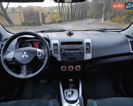 Серый Мицубиси Аутлендер ХЛ, объемом двигателя 2.4 л и пробегом 307 тыс. км за 8299 $, фото 36 на Automoto.ua