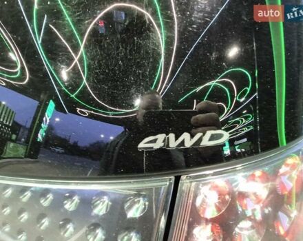 Серый Мицубиси Аутлендер ХЛ, объемом двигателя 2.2 л и пробегом 268 тыс. км за 8999 $, фото 68 на Automoto.ua