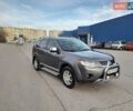 Серый Мицубиси Аутлендер ХЛ, объемом двигателя 3 л и пробегом 173 тыс. км за 10300 $, фото 1 на Automoto.ua
