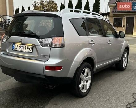Серый Мицубиси Аутлендер ХЛ, объемом двигателя 3 л и пробегом 129 тыс. км за 10450 $, фото 17 на Automoto.ua