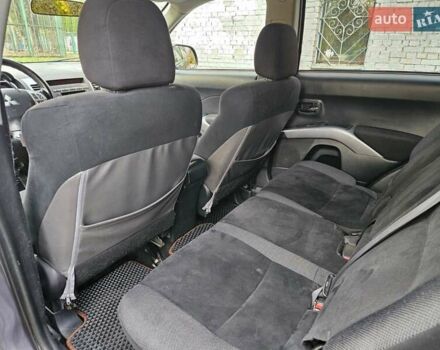 Серый Мицубиси Аутлендер ХЛ, объемом двигателя 2 л и пробегом 450 тыс. км за 4600 $, фото 11 на Automoto.ua