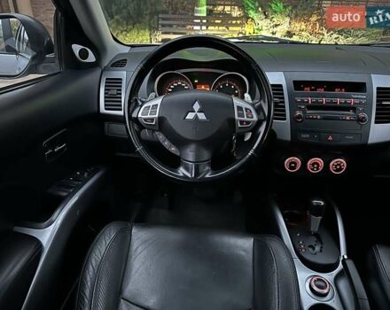 Серый Мицубиси Аутлендер ХЛ, объемом двигателя 3 л и пробегом 129 тыс. км за 10450 $, фото 32 на Automoto.ua