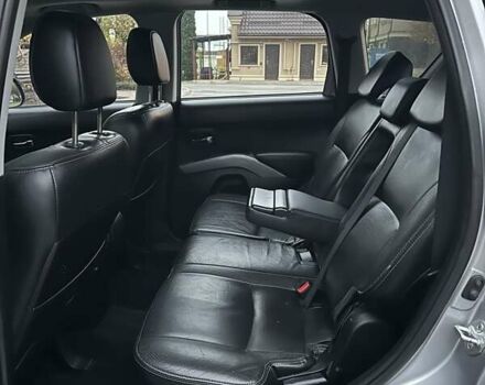 Серый Мицубиси Аутлендер ХЛ, объемом двигателя 3 л и пробегом 129 тыс. км за 10450 $, фото 38 на Automoto.ua