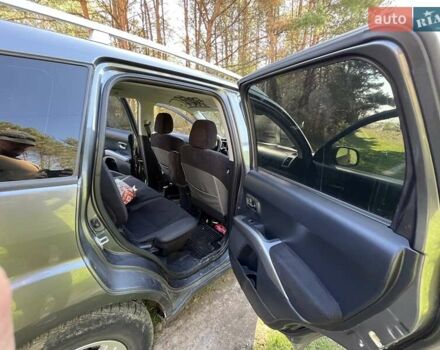 Серый Мицубиси Аутлендер ХЛ, объемом двигателя 2 л и пробегом 247 тыс. км за 5000 $, фото 3 на Automoto.ua