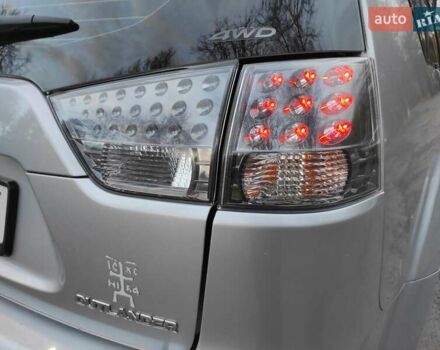 Серый Мицубиси Аутлендер ХЛ, объемом двигателя 2.4 л и пробегом 307 тыс. км за 8299 $, фото 18 на Automoto.ua