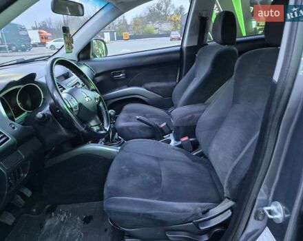 Серый Мицубиси Аутлендер ХЛ, объемом двигателя 2.2 л и пробегом 268 тыс. км за 8999 $, фото 36 на Automoto.ua